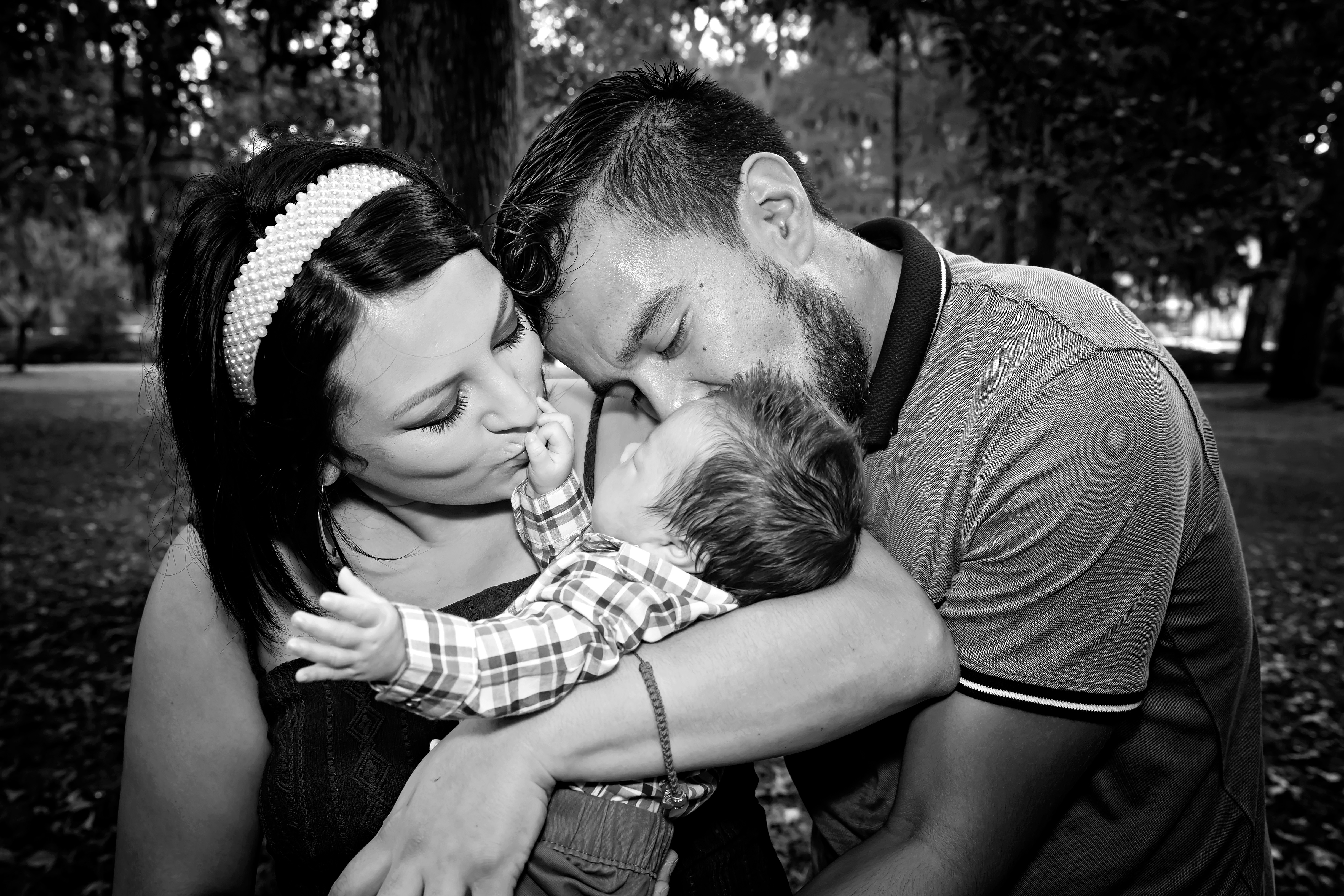 couple holds their infant child